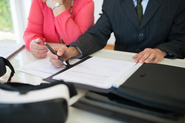 a%20property%20manager%20and%20tenant%20review%20a%20lease%20agreement a%20property%20manager%20and%20tenant%20review%20a%20lease%20agreement